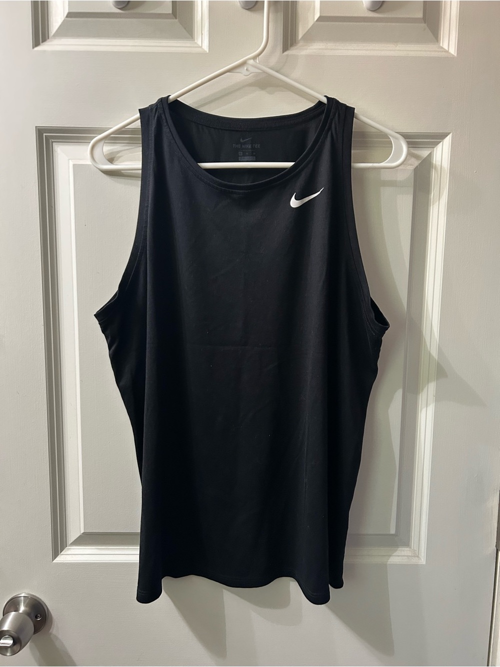 Nike women’s Black Athletic Tank with White Swoosh Logo